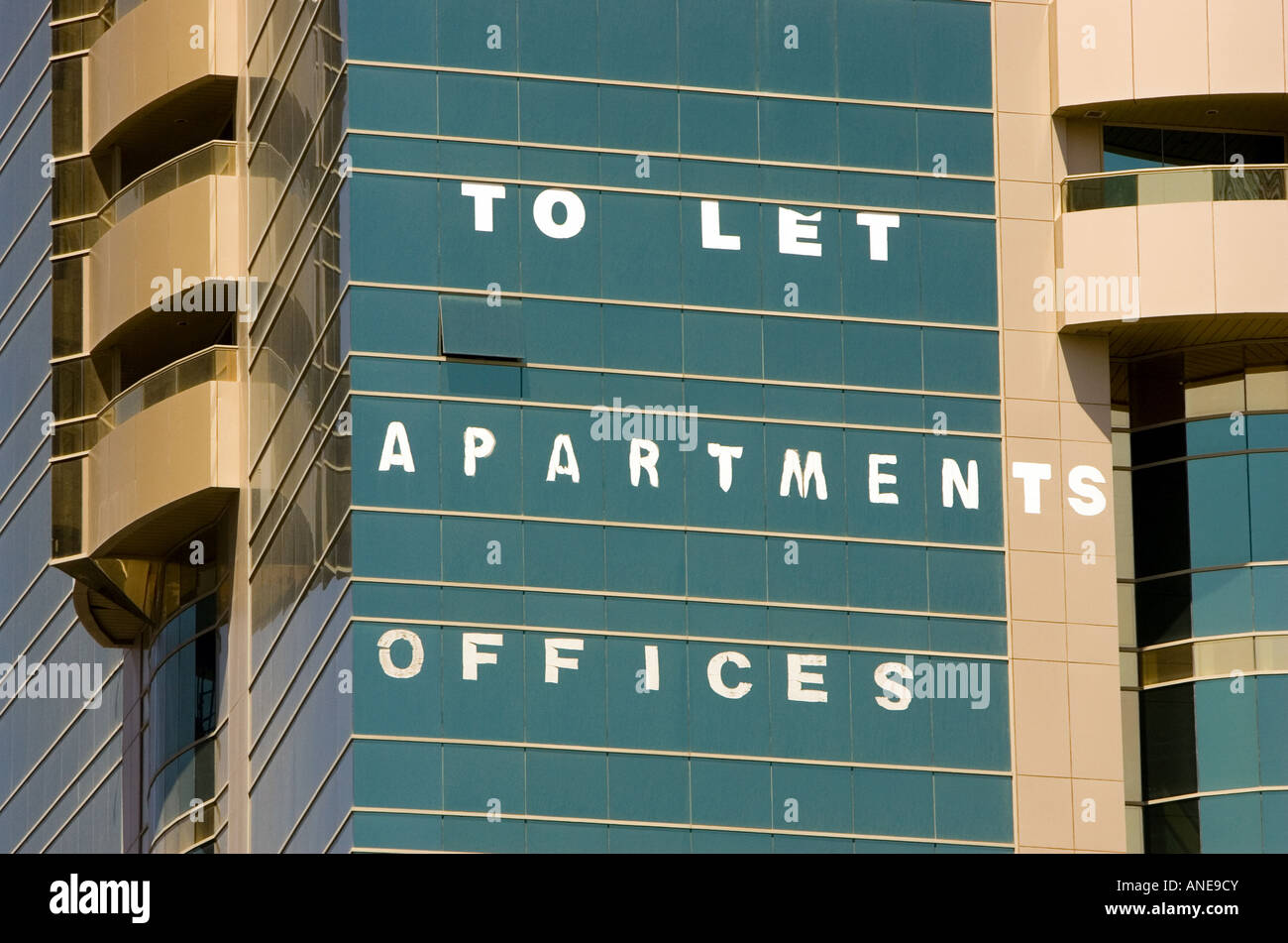 'To Let - Apartments Offices' signage on office building in Dubai, UAE. Stock Photo