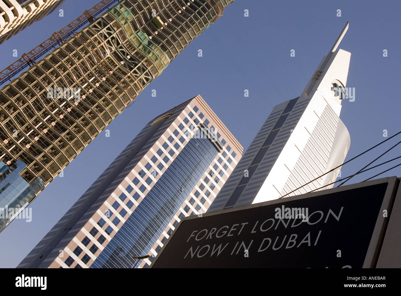 Advertising board on Sheikh Zayed Road with skyscrapers behind in Dubai, UAE. Stock Photo
