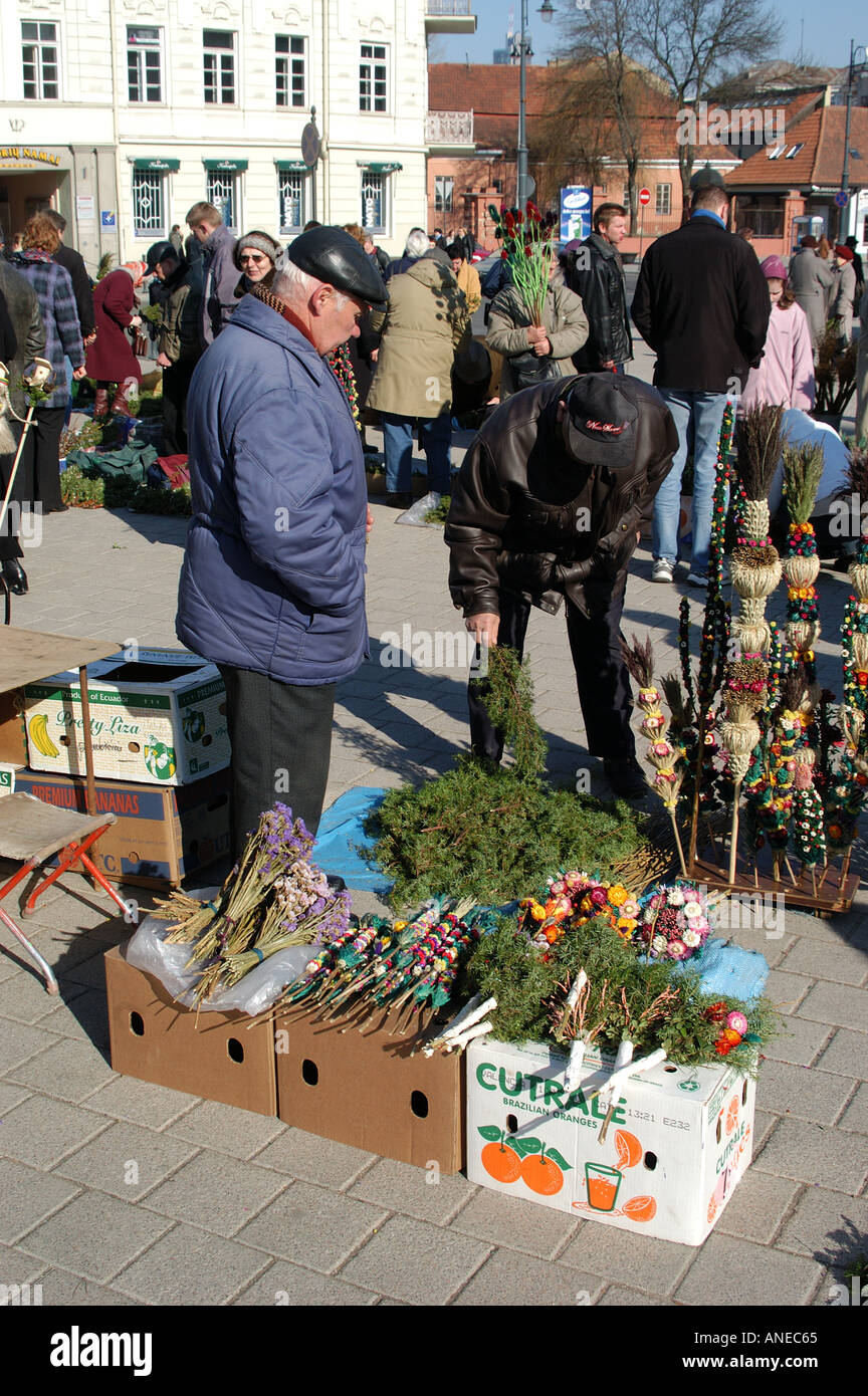 Trader selling flowers outside Cathedral Vilnius Lithuania Stock Photo