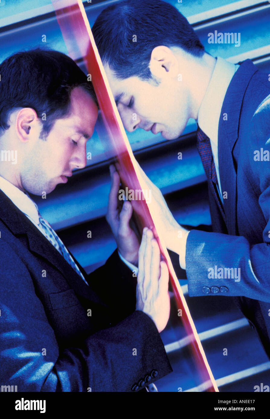 Businessmen and wall Stock Photo