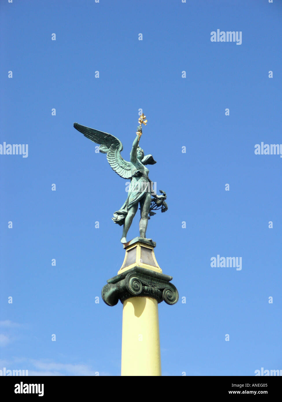 Torch bearing winged Statue on a Plain Column with an Ionic Capital Cechuv Bridge Prague Stock Photo