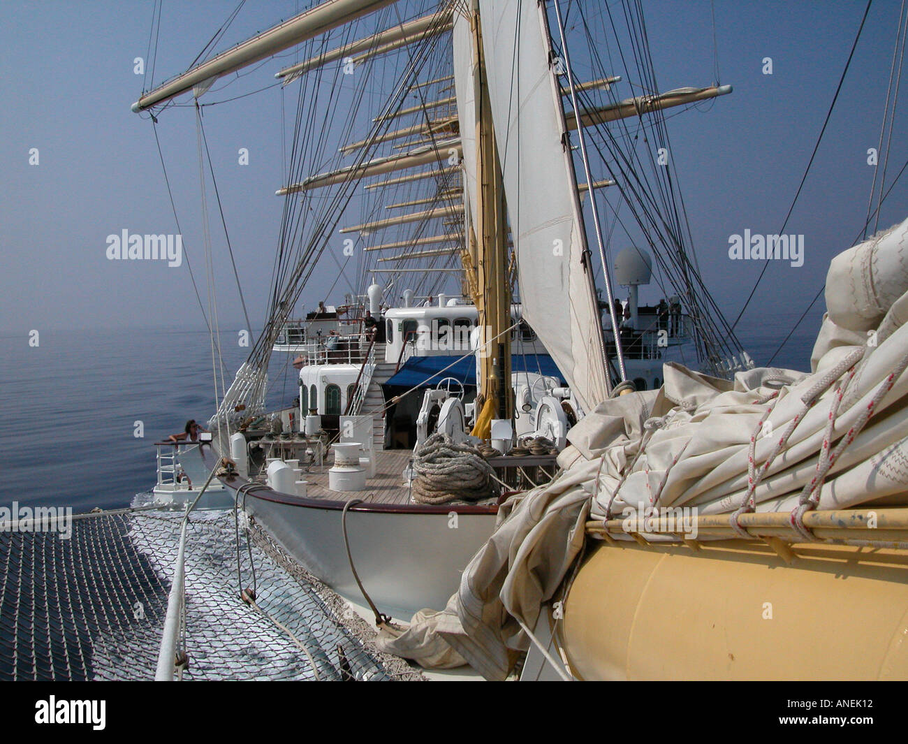 Looking back along the five masted sailing ship Royal Clipper from the bowsprit nets Stock Photo