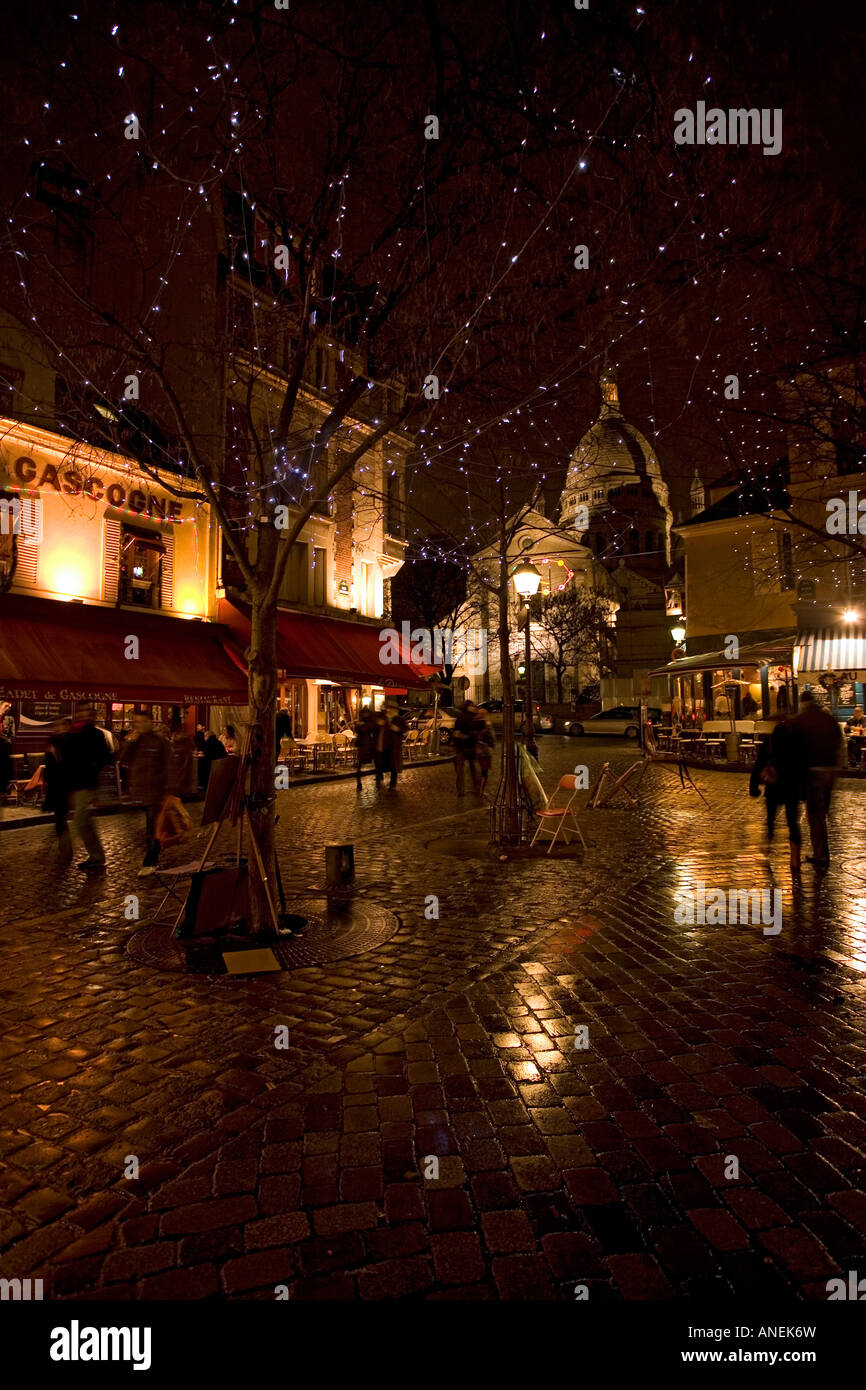 Night in the Place du Tertre and Sacre Coeur Chruch in Montmartre Paris France Stock Photo