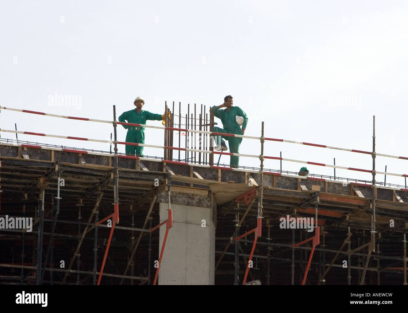 Indian construction workers on a building site in Dubai, UAE. Stock Photo