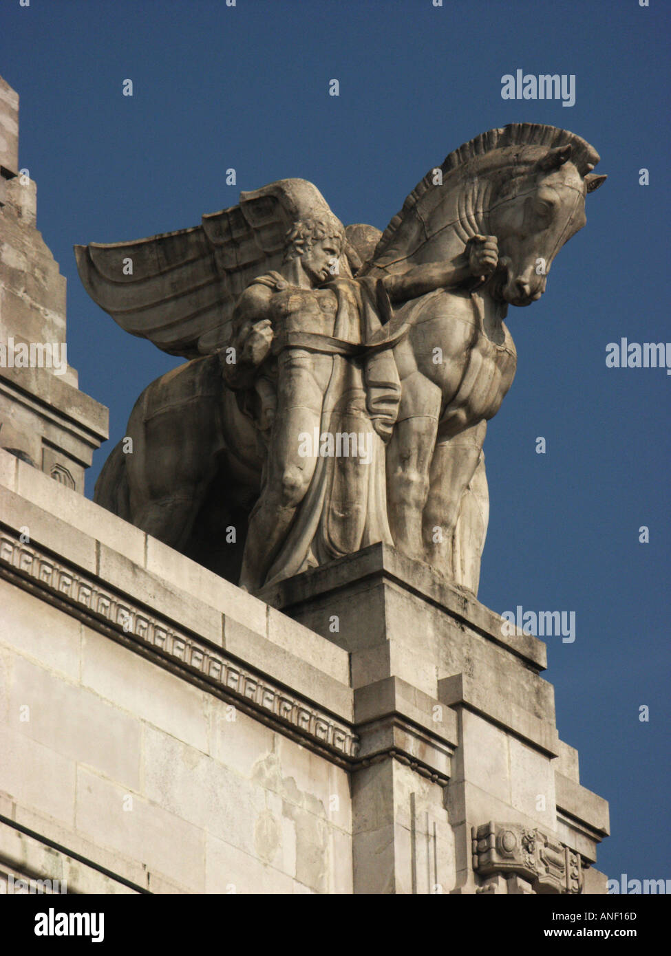 Fascist symbolism in the sculpture of Milan´s Mussolini era central railway station Stock Photo