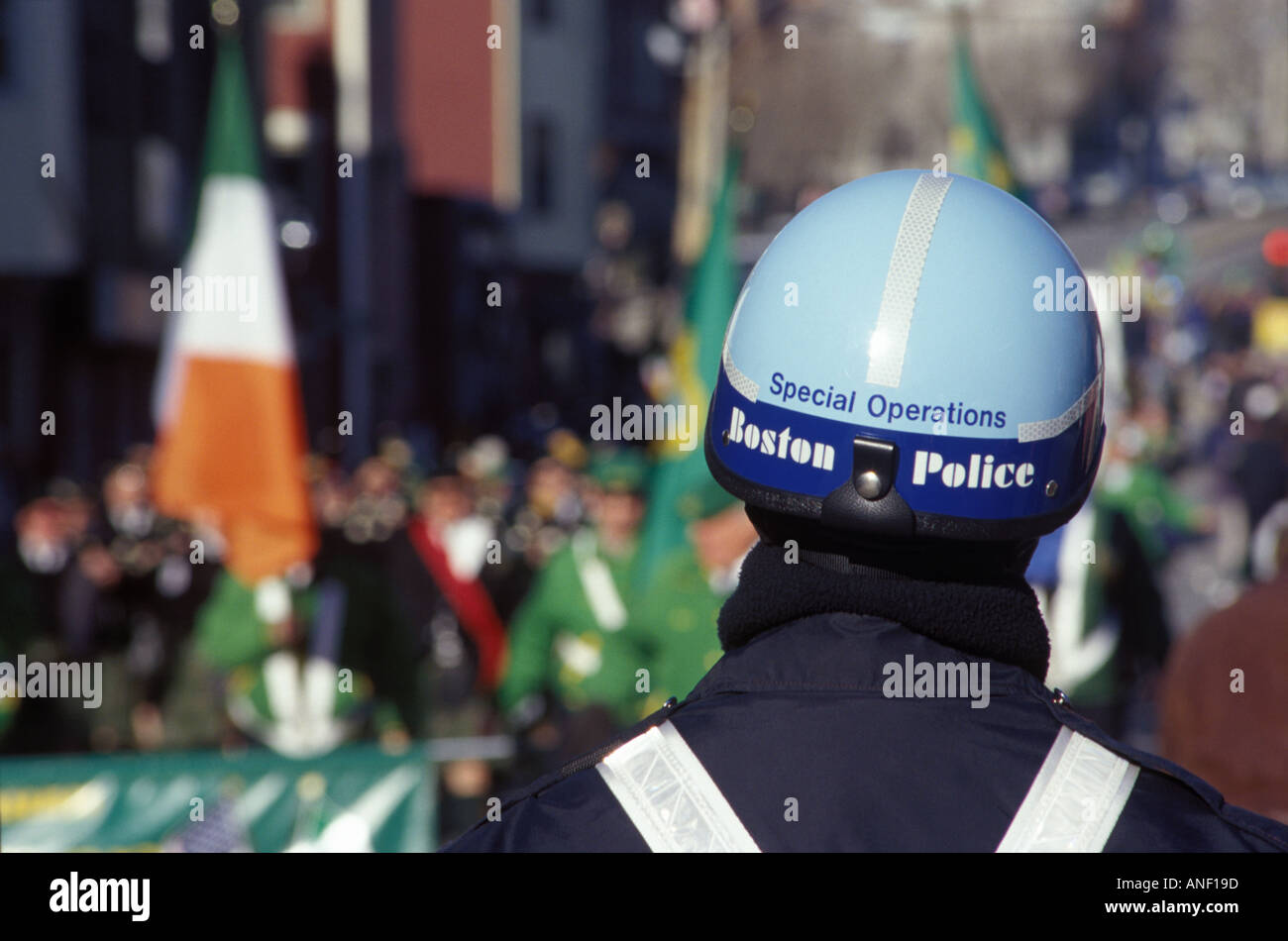 Boston police monitor the Saint Patrick s Day Parade through South Boston Stock Photo