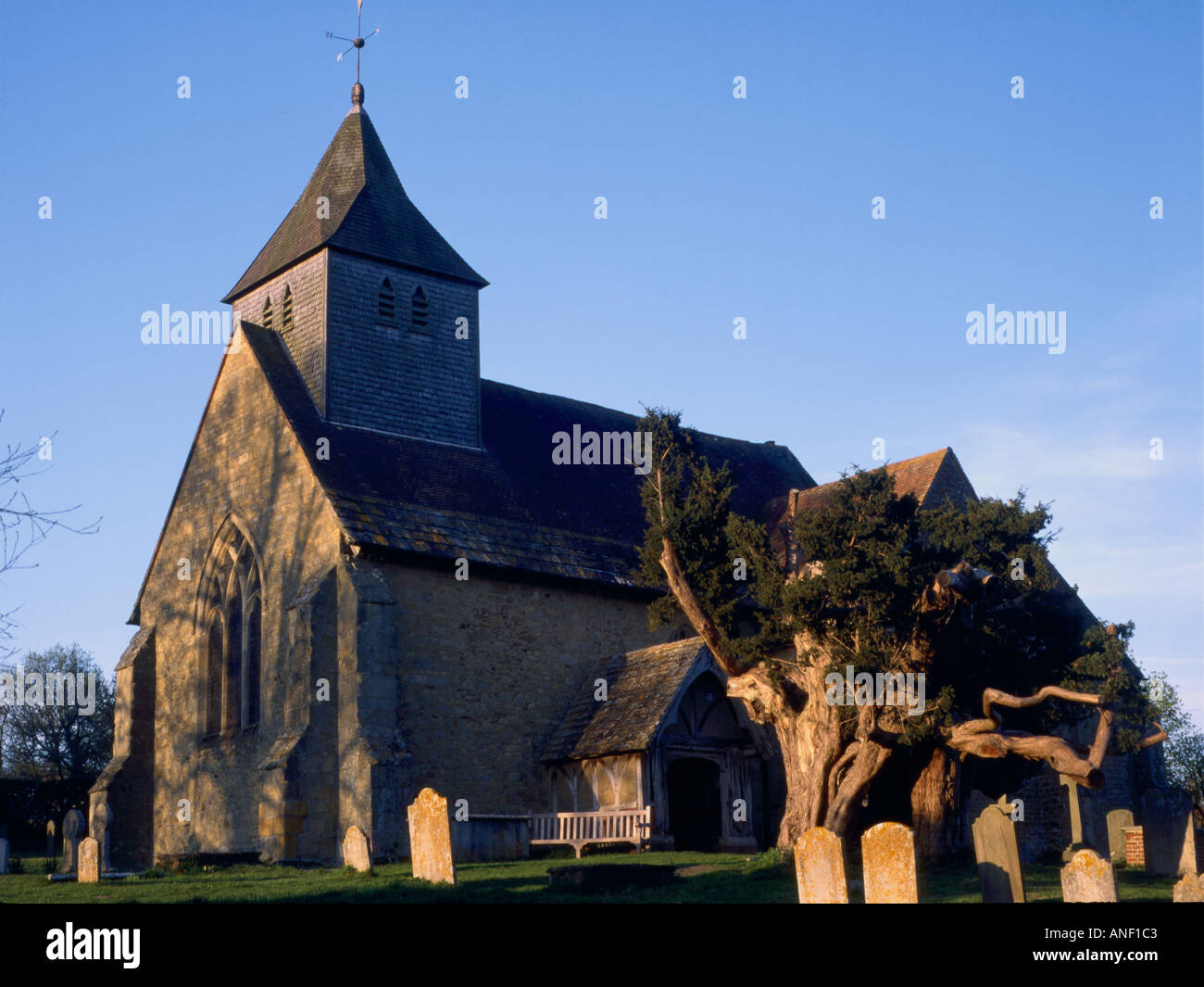 The Parish Church of St Mary and All Saints Dunsfold Stock Photo