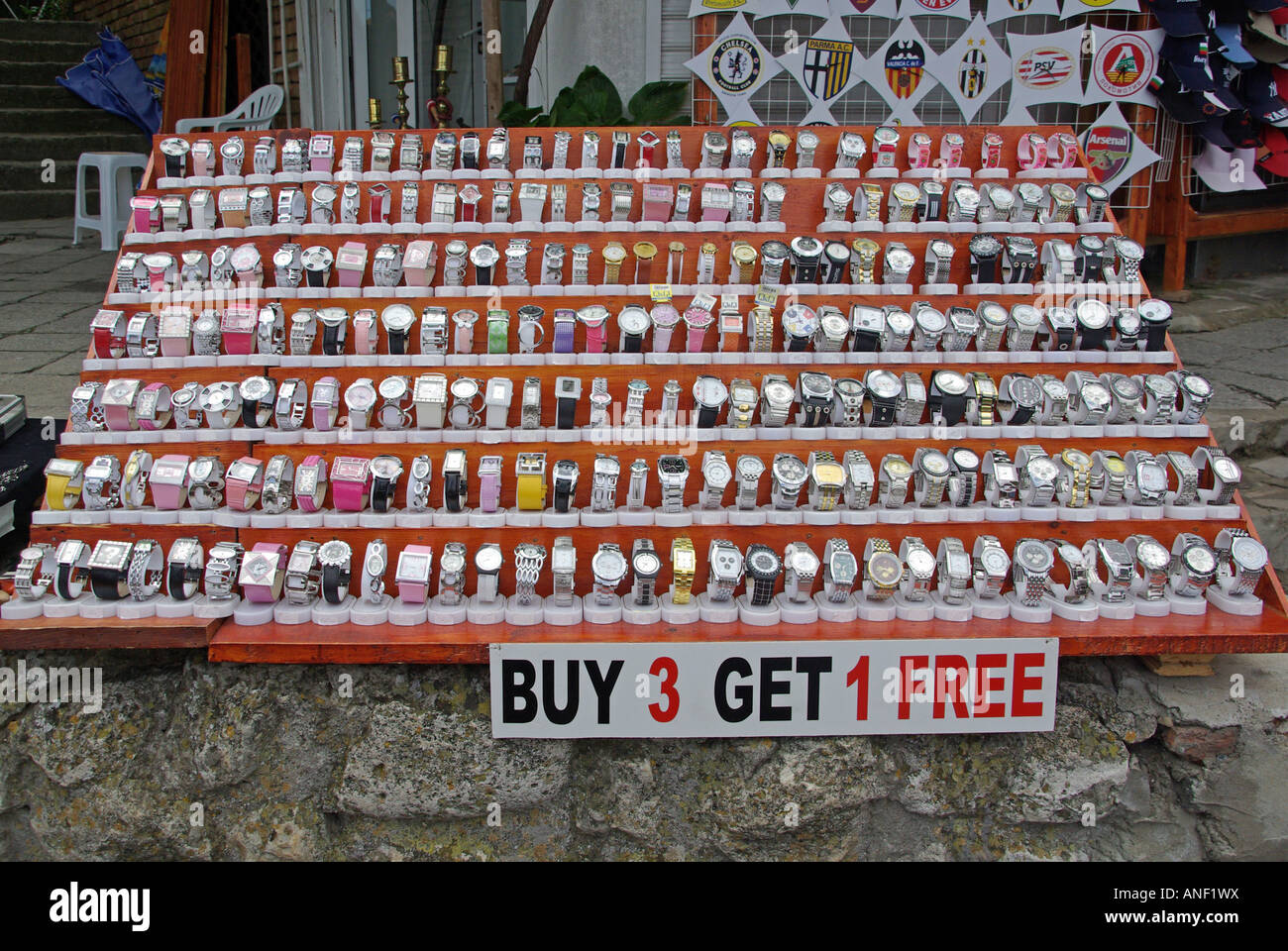 Nessebar Bulgaria outdoor roadside stall with watches for sale buy three get one free Stock Photo