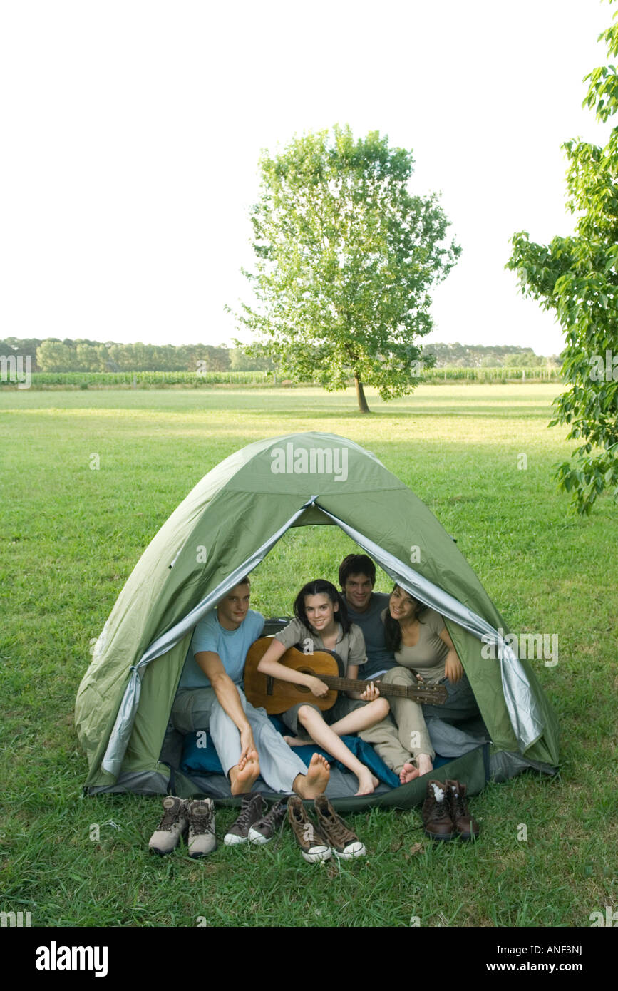 Friends in tent together Stock Photo Alamy