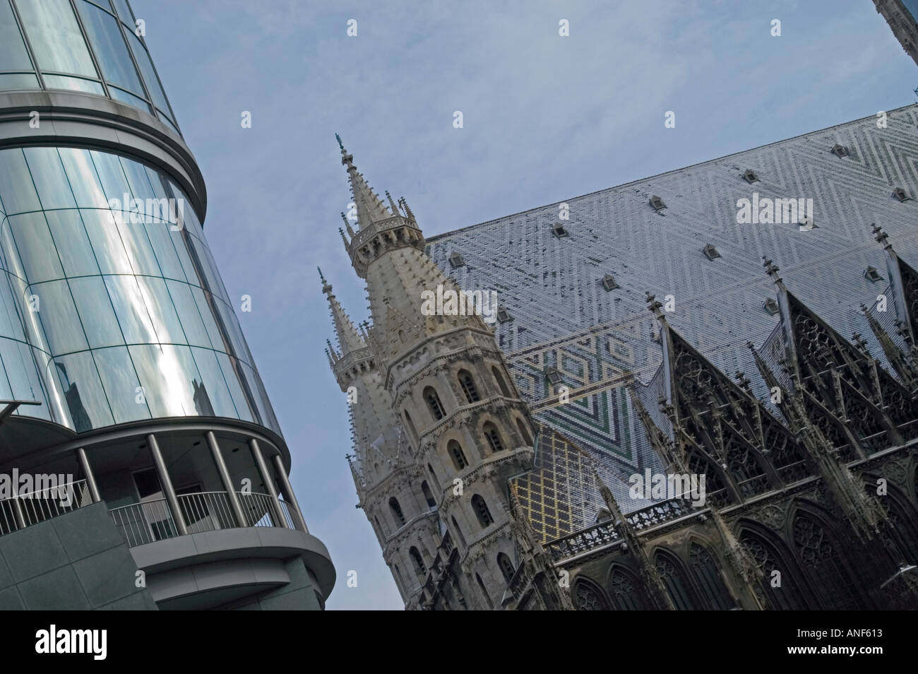 St. Stephens Cathedral in Vienna, snow on the roof, Haas house Stock Photo