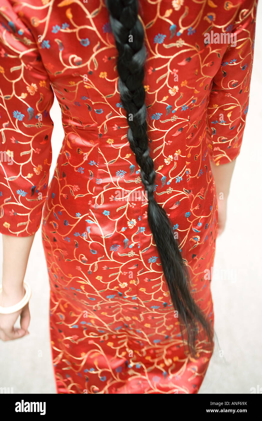 Young woman dressed in traditional Chinese clothing with long braid, rear view, close-up Stock Photo