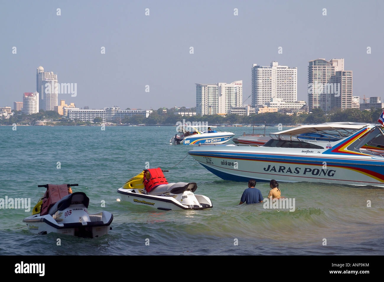 Boats off Pattaya Beach Stock Photo