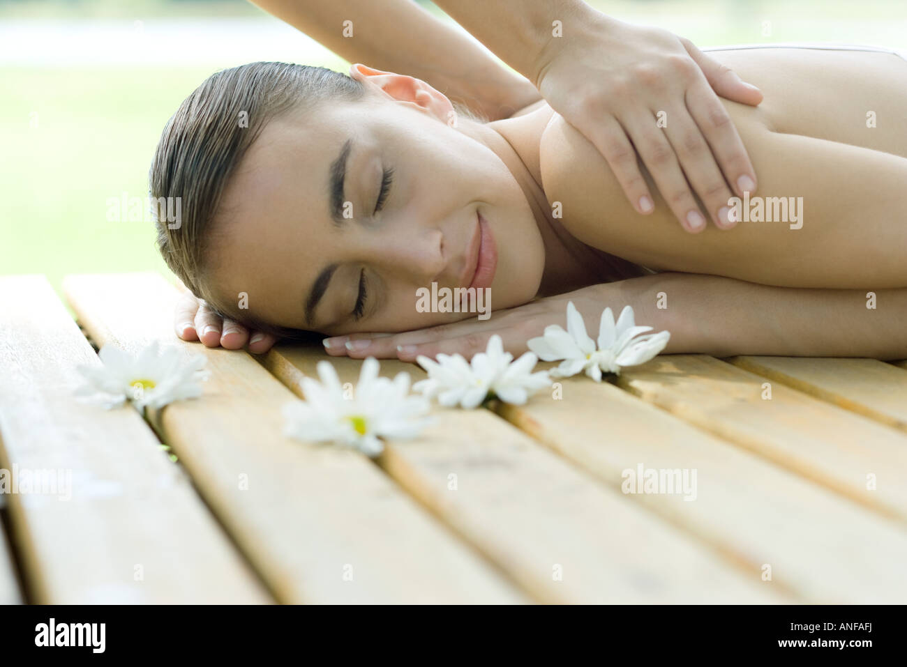 Woman receiving back massage Stock Photo