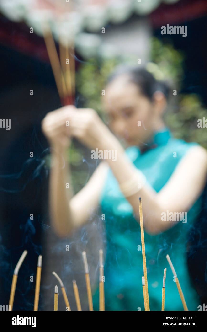 One woman hold temples hi-res stock photography and images - Alamy