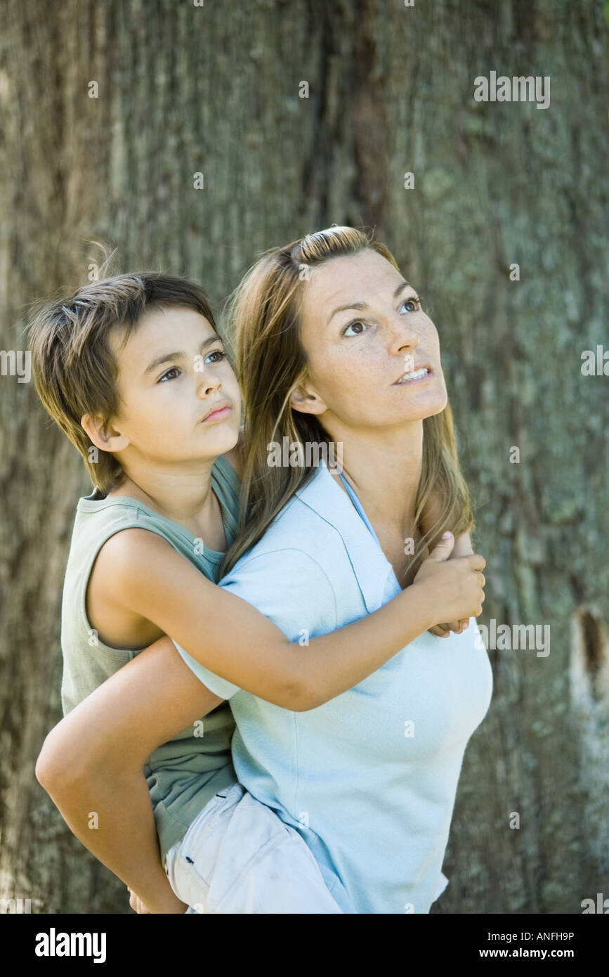 Mother carries son in hi res stock photography and images Alamy