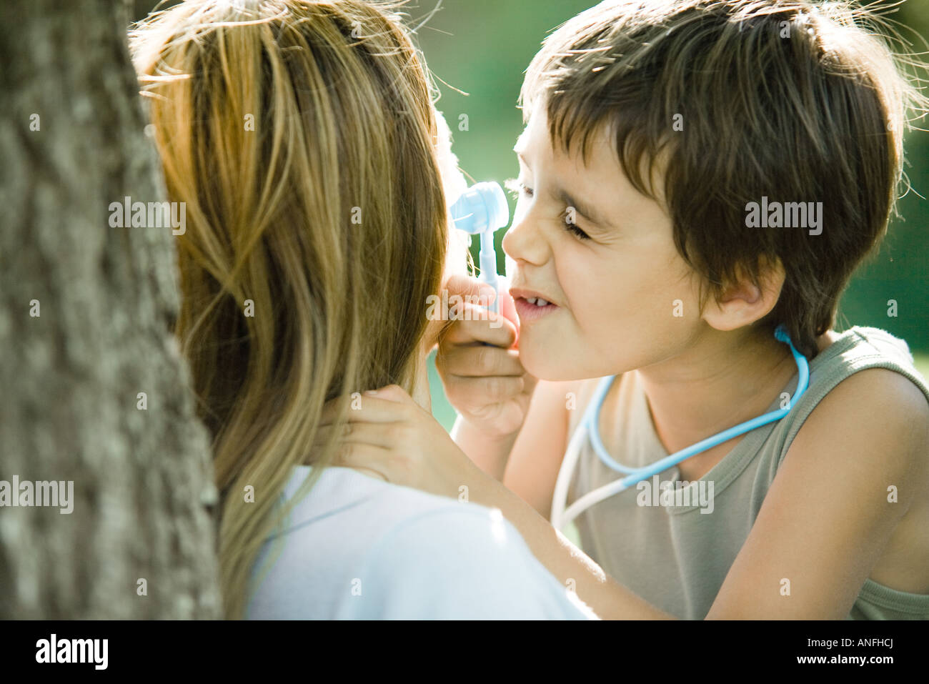 Mother son boy pretending doctor hi-res stock photography and images ...