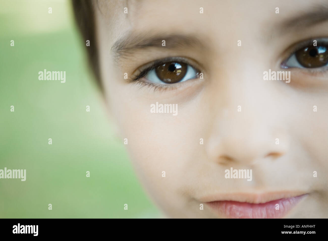 Little boy looking at camera, cropped view of face, close-up Stock ...