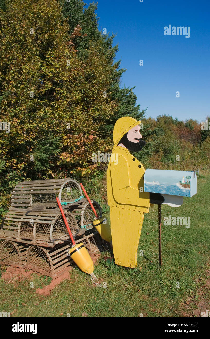 Folk Art fisherman mailbox and lobster traps along Route 16, Prince