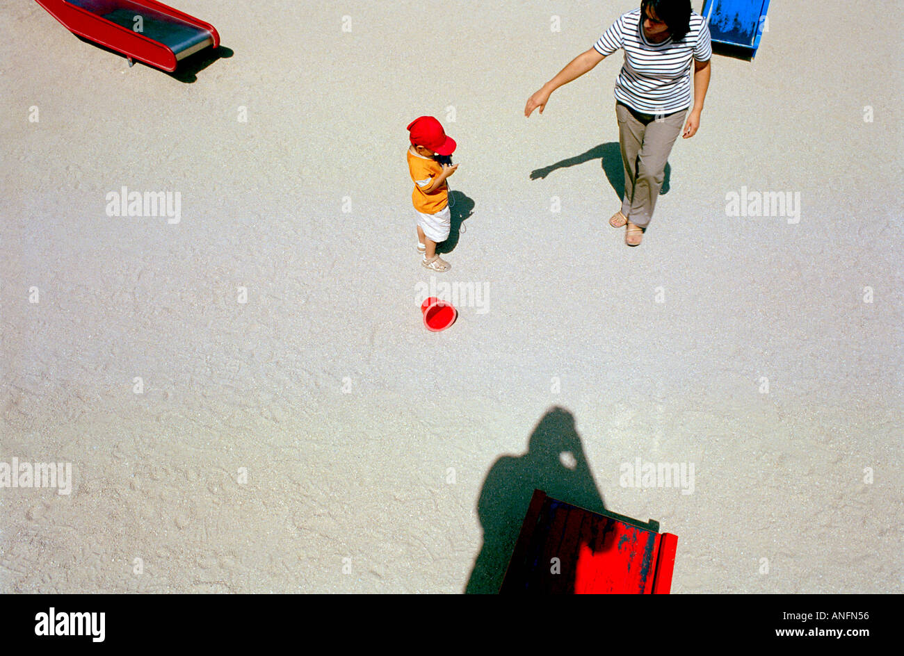 mother and child in a playground Stock Photo - Alamy