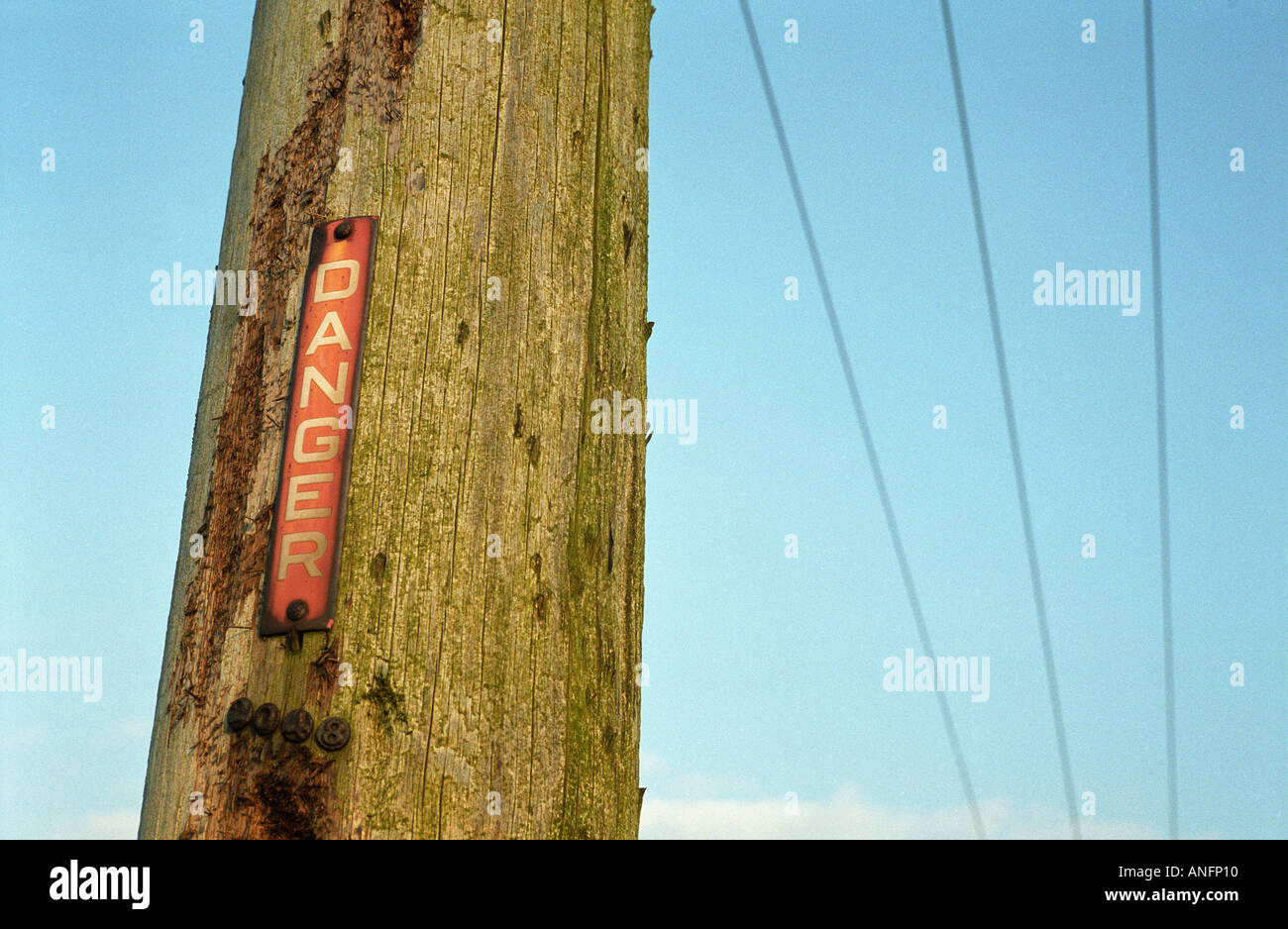 red danger sign on telegraph pole Stock Photo
