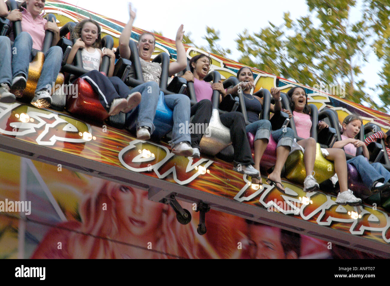 Baby Rides Fair Children enjoying a funfair ride hi-res stock photography and images ...