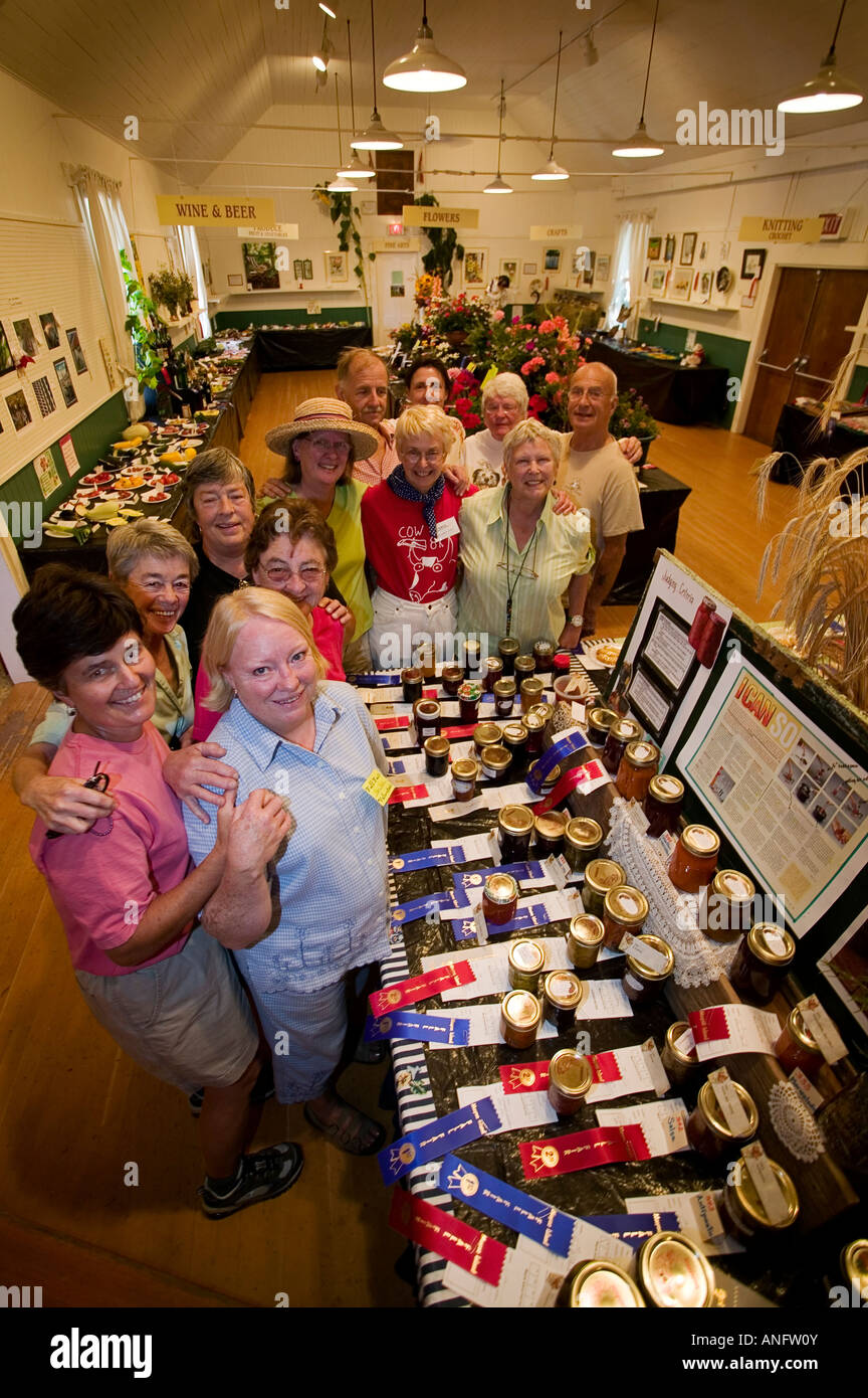 Members of the Mayne Agricultural Society display their jams and jellies at the annual Mayne fall fair, Mayne Island, British Co Stock Photo