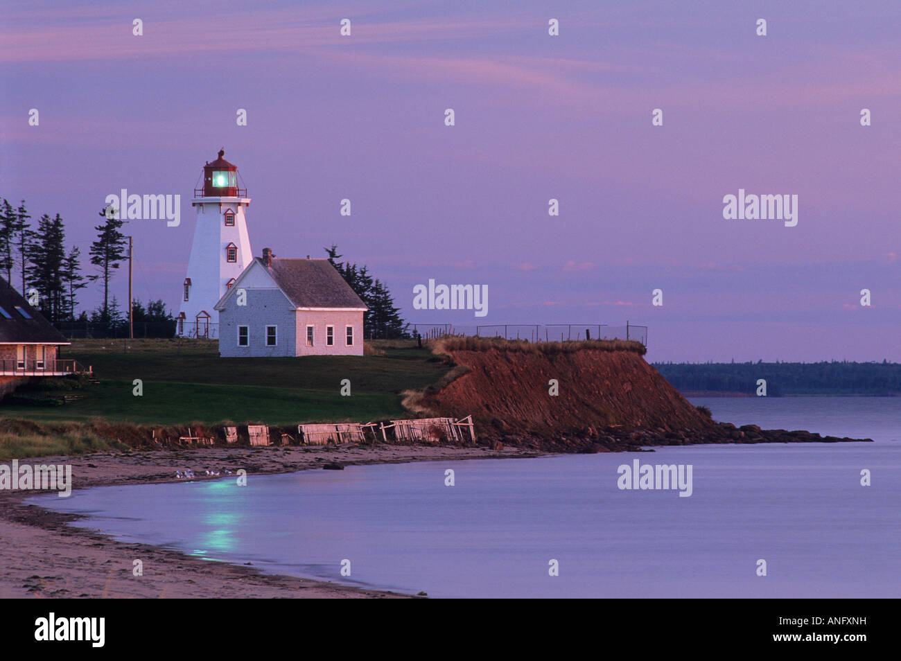 Lighthouse at sunset in Panmure Island Provincial Park, Prince Edward Island, Canada Stock Photo