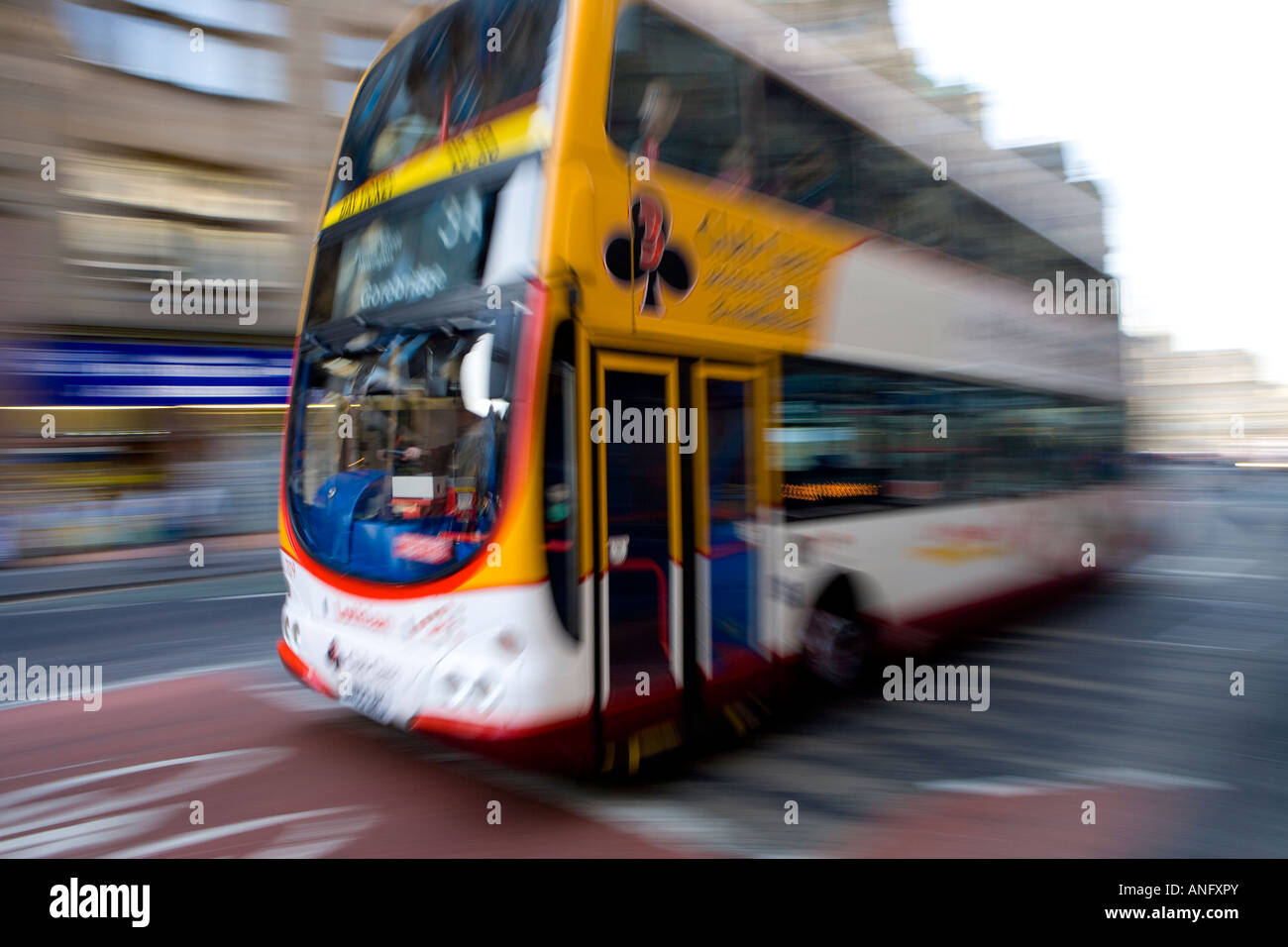 Bus speeding past Stock Photo Alamy