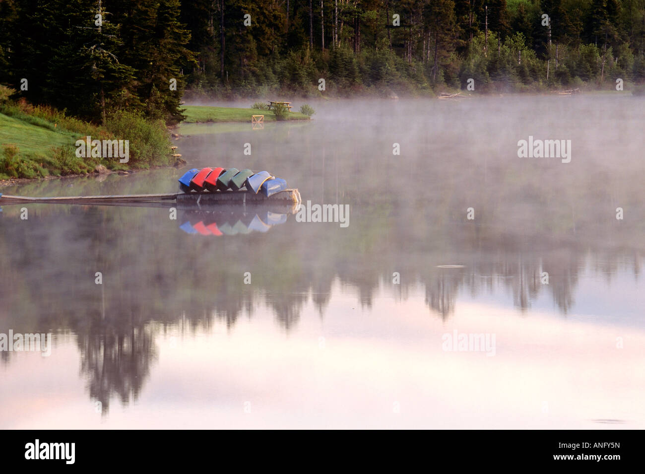 Canoes in fog on lake hires stock photography and images Alamy