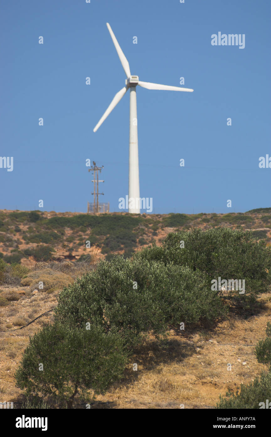 Greece Crete East Coast Palekastro area wind farm modern windmill producing electricity view with olive trees in frgd vertical Stock Photo