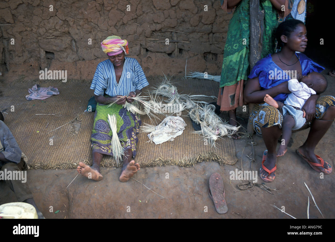 AFRICA KENYA KWALI Kenyan family on the porch of their rural home