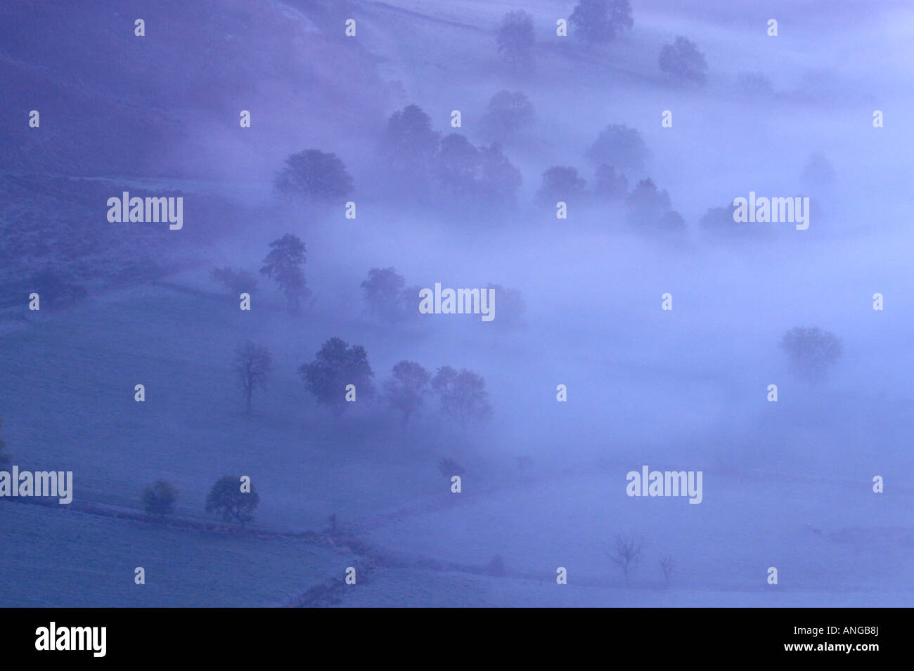 The Hope Valley and lose Hill shrouded in mist at dawn Stock Photo Alamy