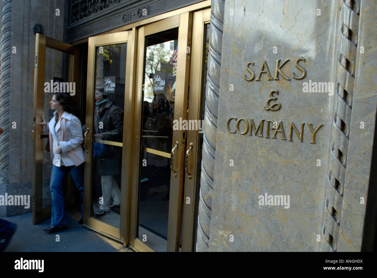 Christmas shoppers at Saks Fifth Avenue in NYC Stock Photo