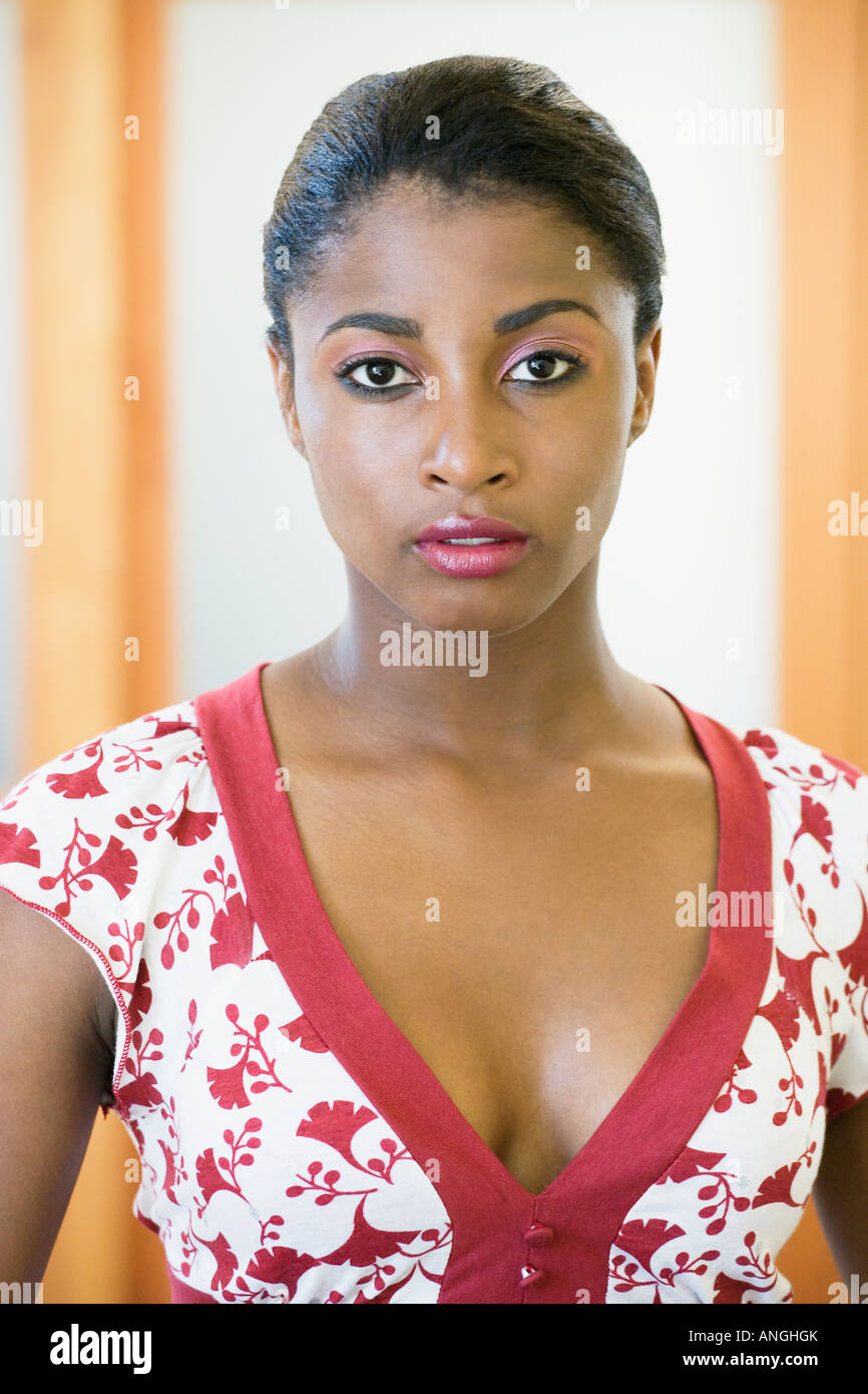 African woman wearing v neck blouse Stock Photo