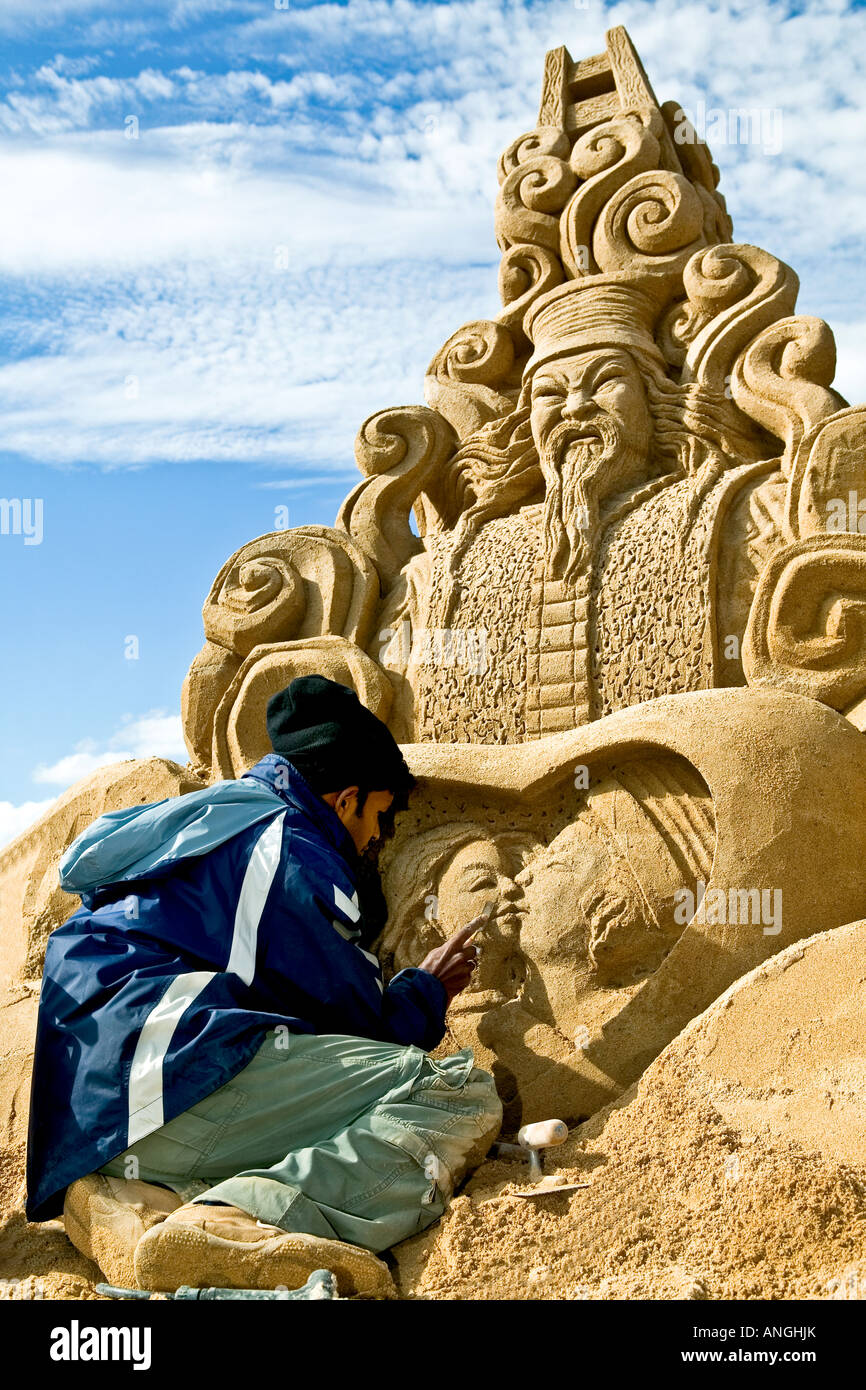 Building a sand sculpture Stock Photo Alamy