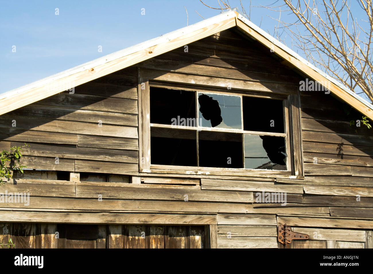 broken window in New Orleans Lower Ninth 9th Ward Stock Photo