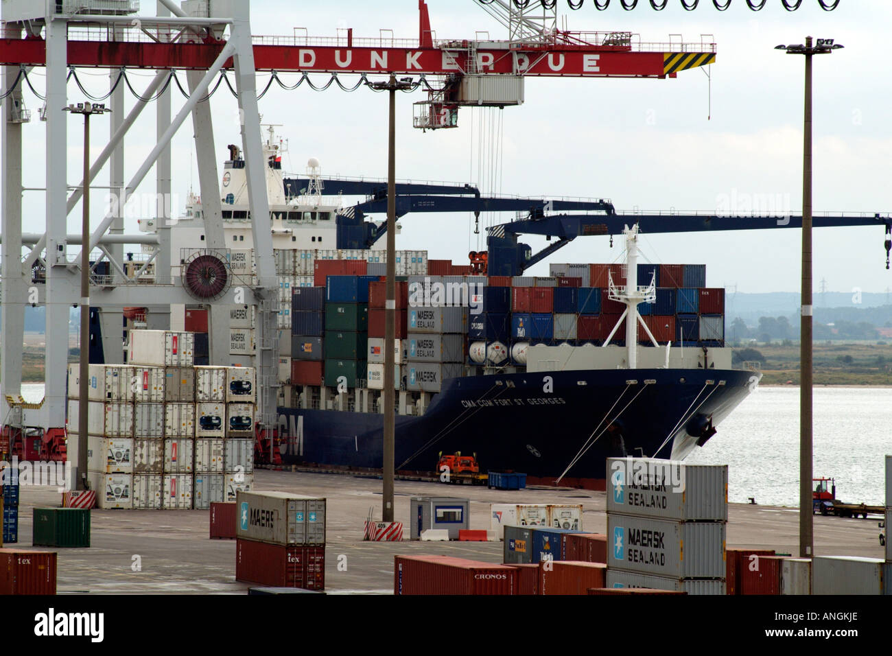 Container Port of  Dunkerque in northern France Europe EU. Container carrier ship Fort St George owned by CMA CGM company Stock Photo