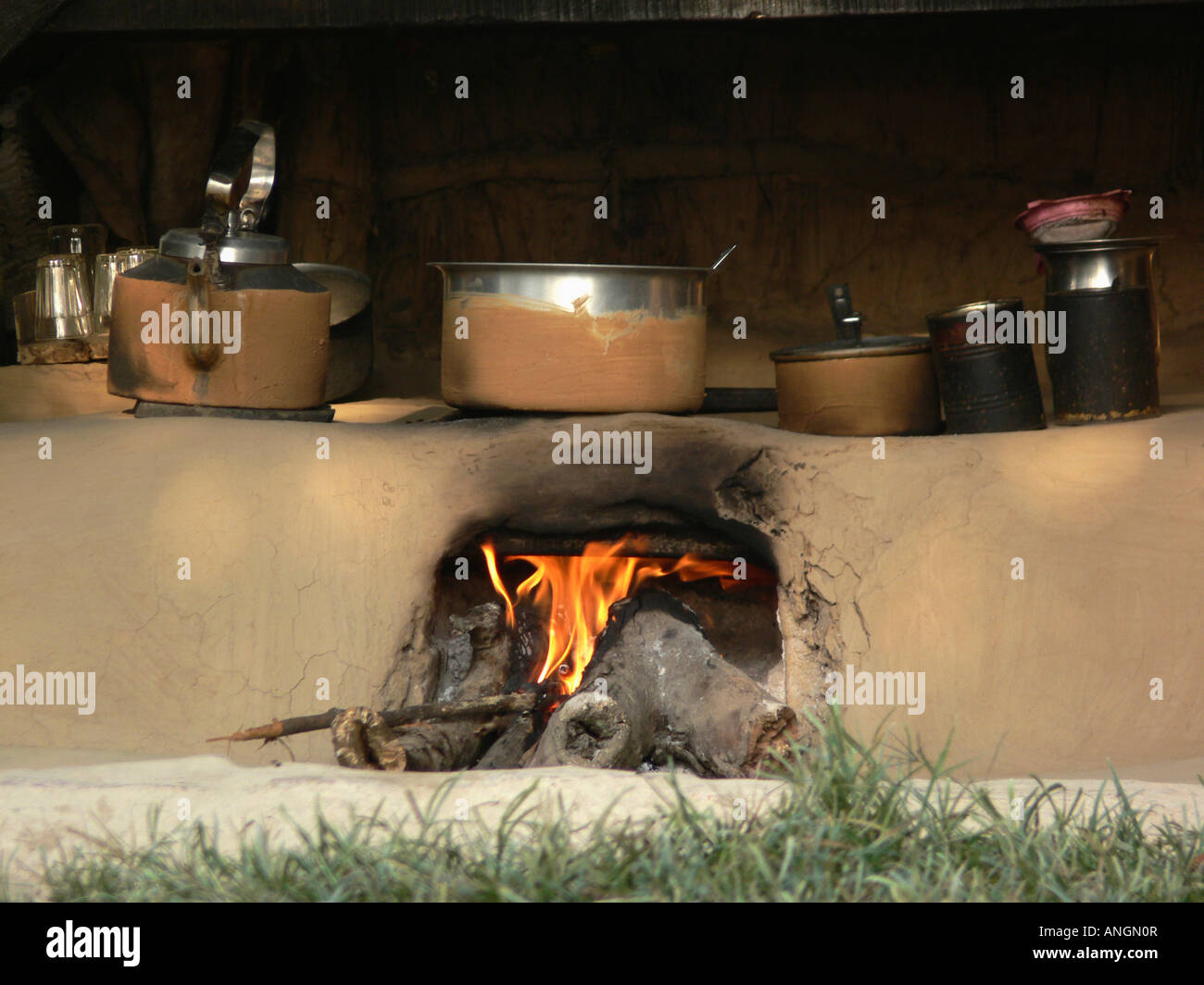 Cooking Utensils On Traditional Log Fire Stock Photo 15523990 Alamy