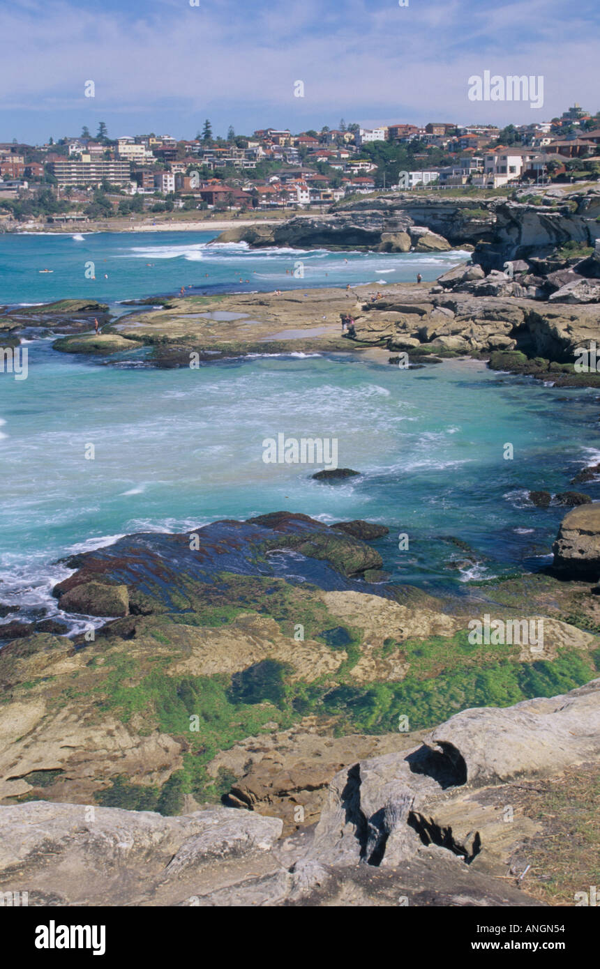 Bondi to Coogee famous costal walk, view of coves with town of Bronte in distance. Sydney NSW, Australia. Stock Photo
