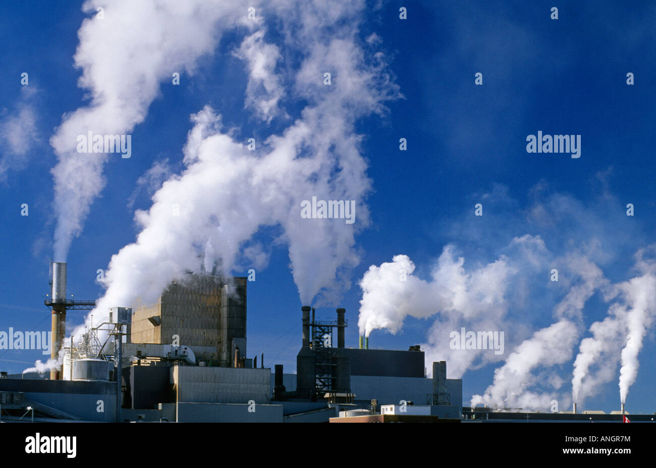 air pollution from pulp and paper mill, Dryden, Ontario, Canada. Stock Photo