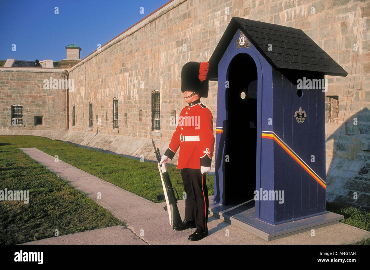 An honor guard from the Royal 22nd Regiment of the Canadian Forces stands on duty in traditional uniform outside The Citadel of Stock Photo