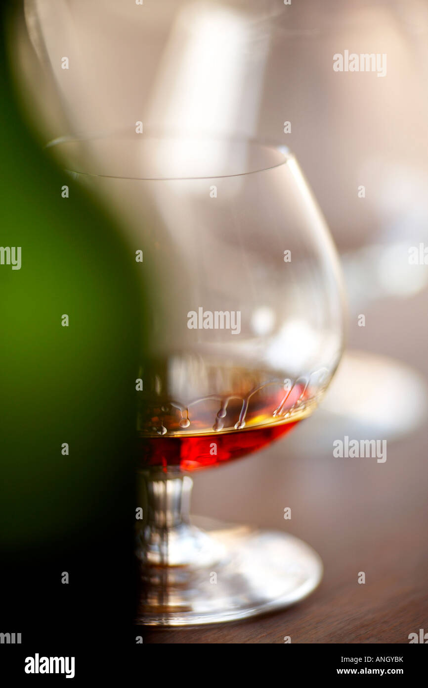 Napoleon Cognac / Brandy in a snifter glass with a wooden background