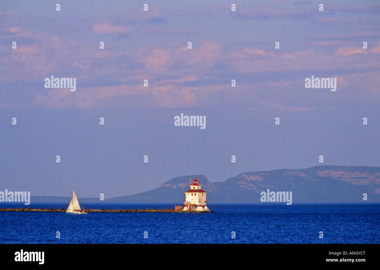 Lighthouse and sailboat, Thunder Bay, Ontario, Canada. Stock Photo