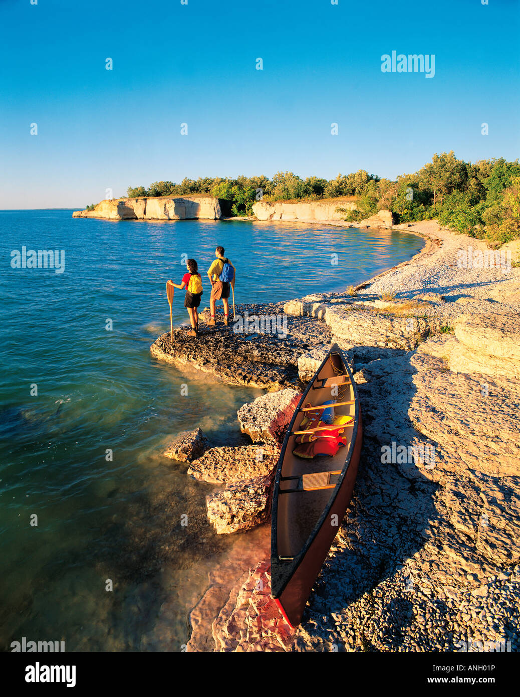 Couple along limestone cliffs, Steep Rock, Lake Manitoba, Manitoba