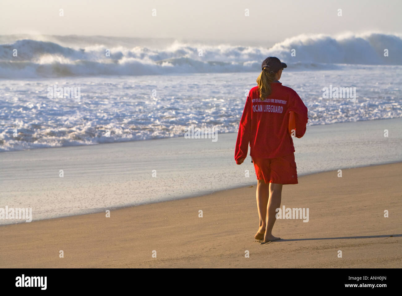 Los Angeles County Lifeguard Watching Big Waves at Zuma Beach Malibu Los Angeles County California United States MR Stock Photo