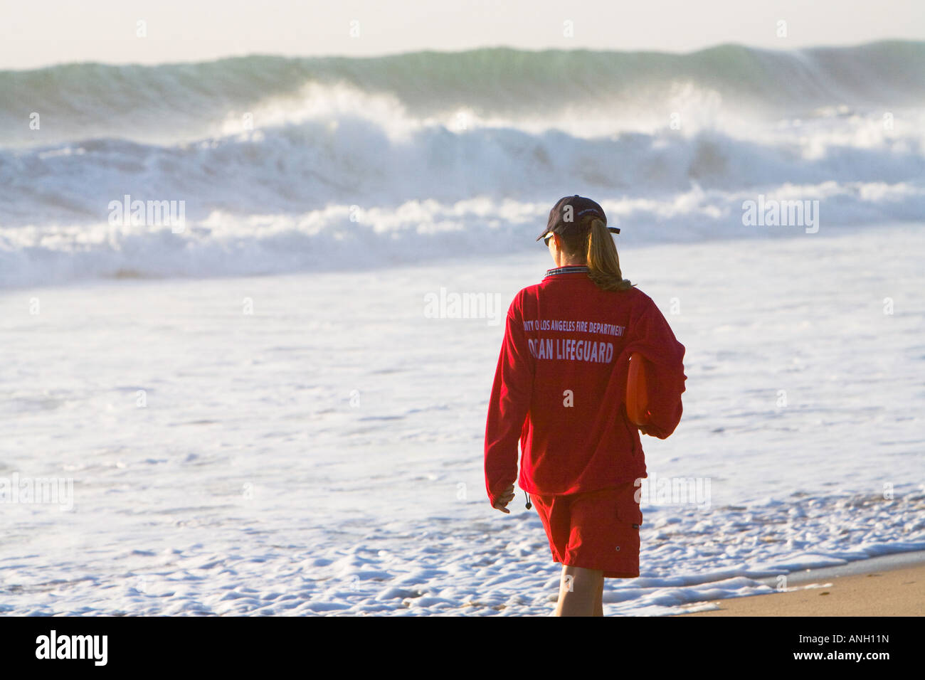 ZUMA BEACH, CALIFORNIA, USA - Lifeguard watching swimmers on Zuma