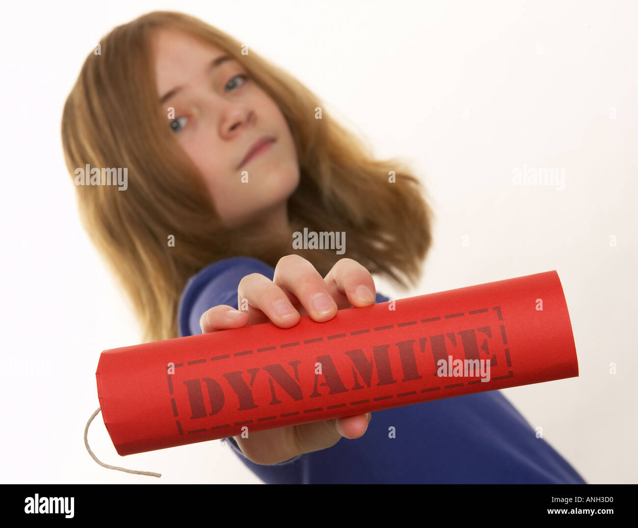 Young white girl holding dynamite stick Stock Photo