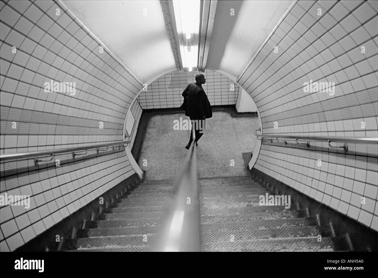 Walking down the stairs of the London Underground , London , UK Stock Photo
