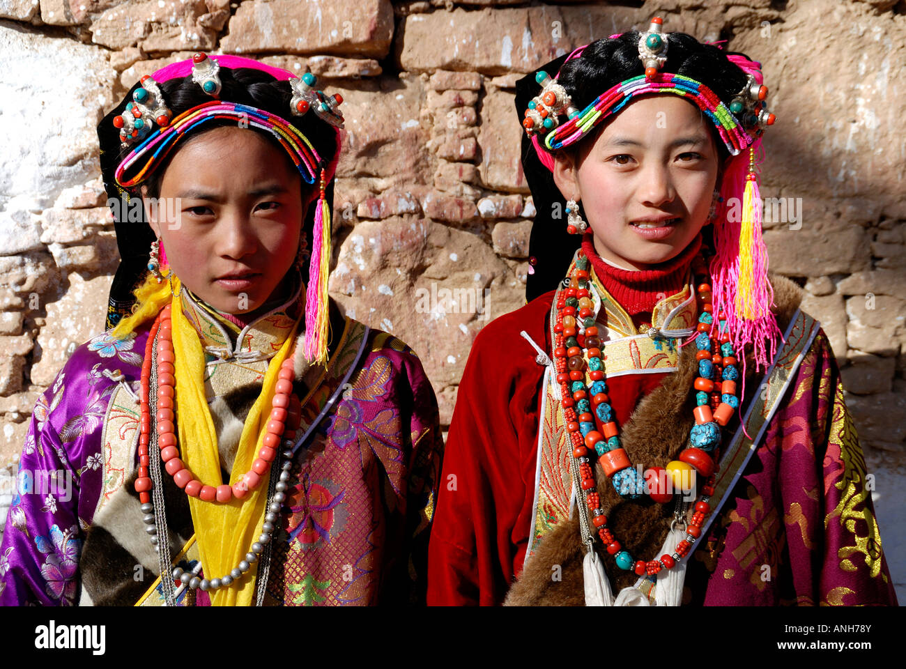 Tibetan wedding party two girl have traditional Tibetan  clothes Stock Photo