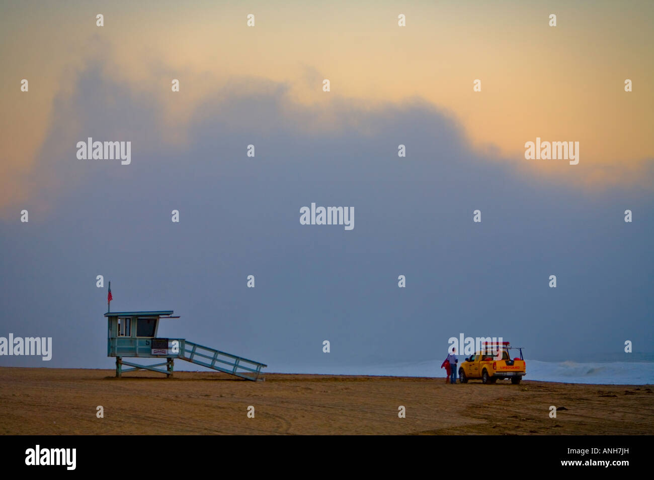 Lifeguard truck in front of lifeguard tower on a foggy afternoon on Westward Beach, Zuma Beach, Malibu, California Stock Photo